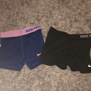 Two pairs of Nike Pro spandex